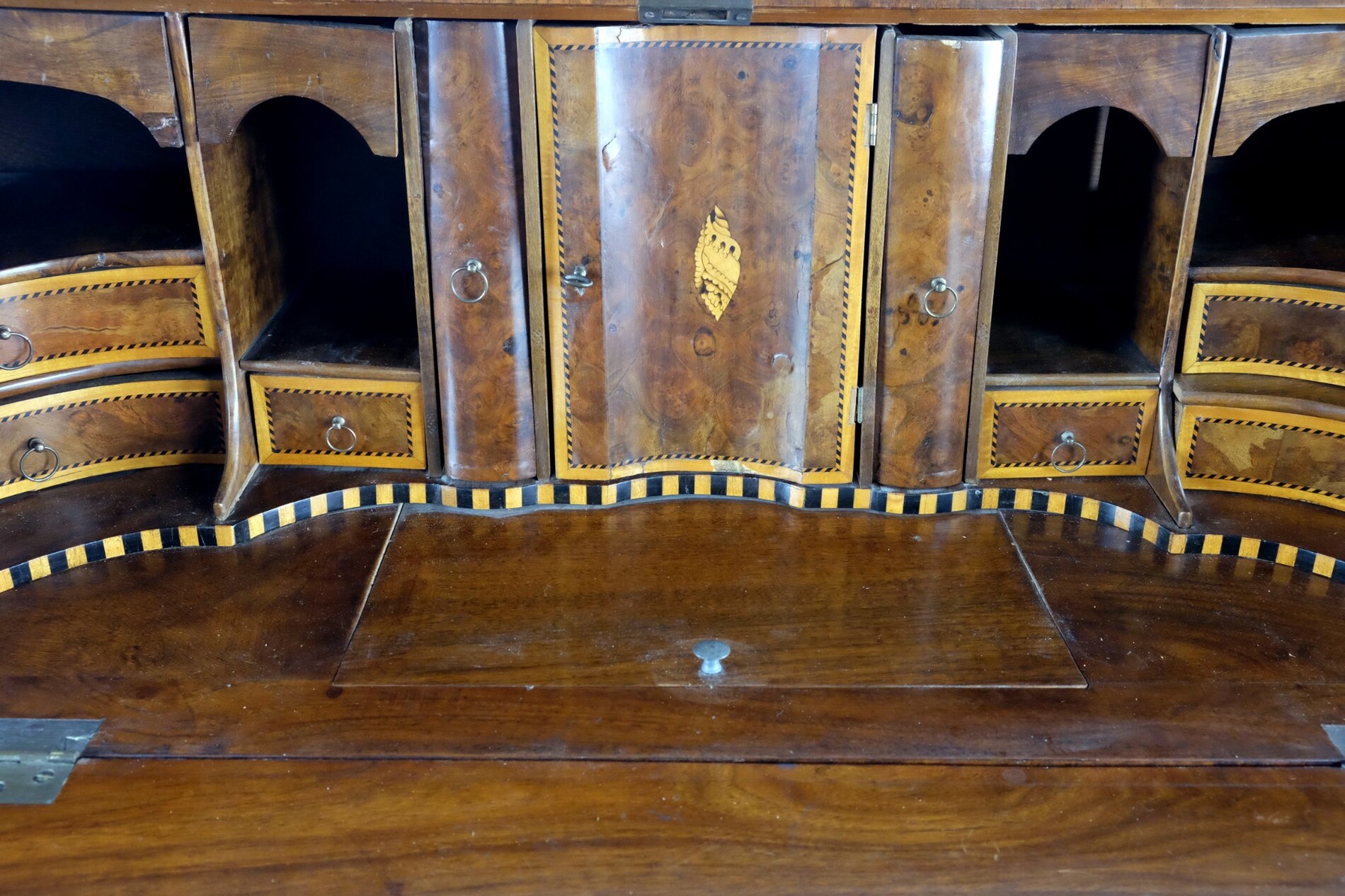 rare burr walnut secretairy with 'open knees'. 