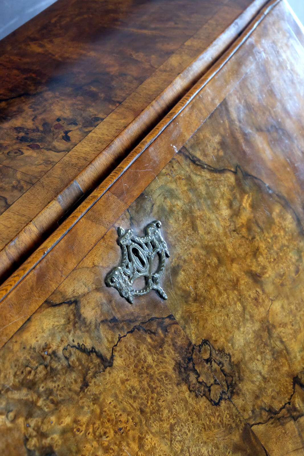rare burr walnut secretairy with 'open knees'. 